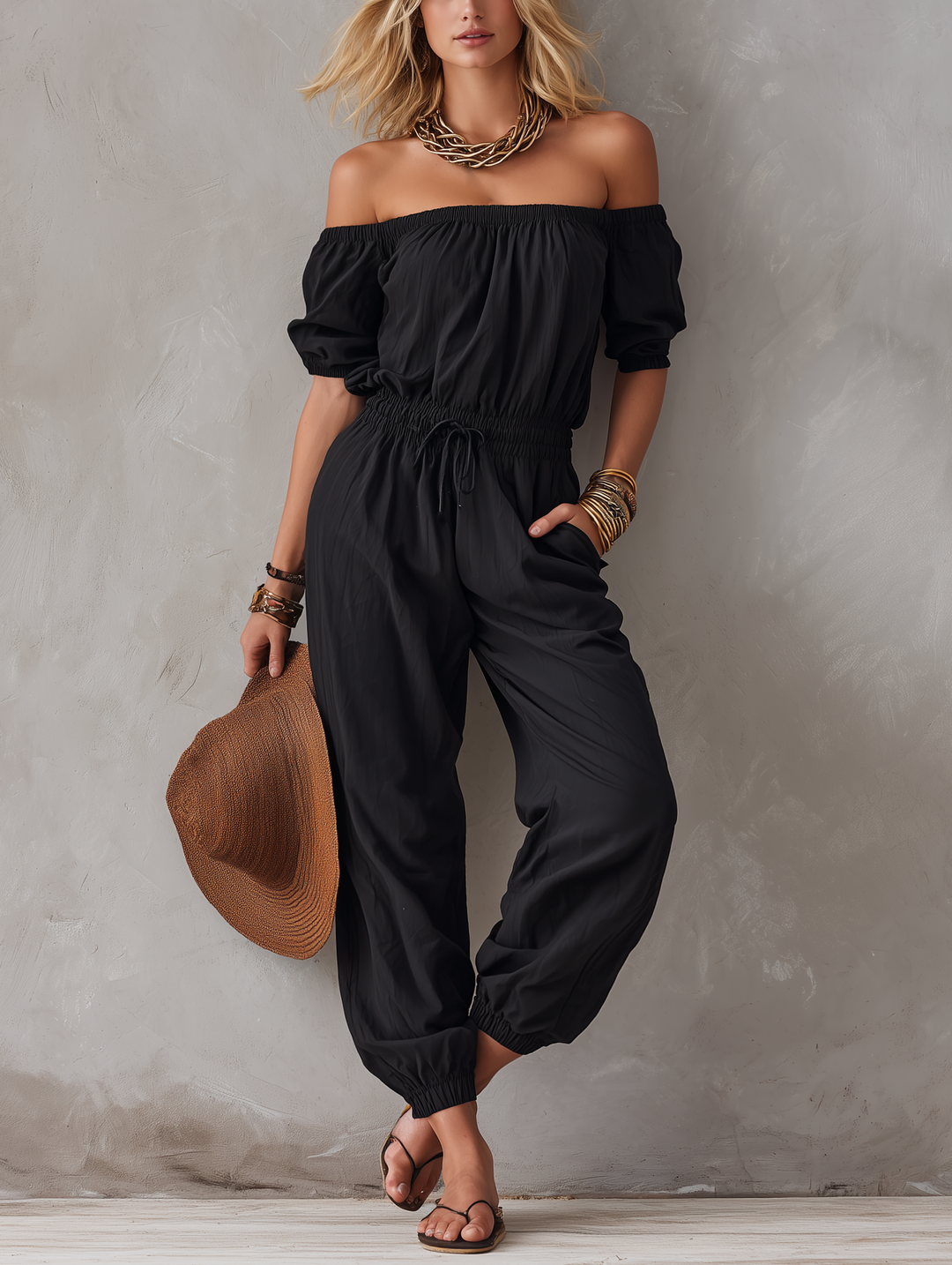 Czarny kombinezon damski off-shoulder bez rękawów