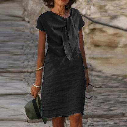 Sukienka damska z krótkim rękawem i dekoltem w łódkę, drapowana i wiązana na szyi | Mini 4