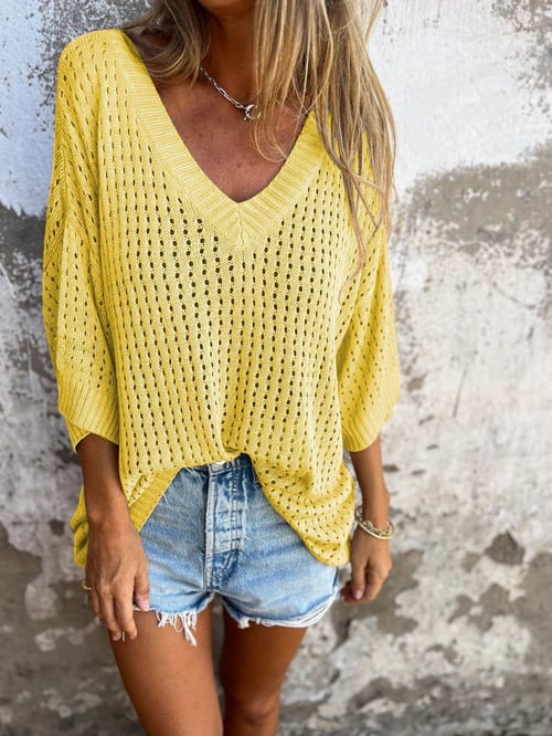 Żółty damski luźny dzianinowy top z dekoltem v i trzyczwartowymi rękawami boho style